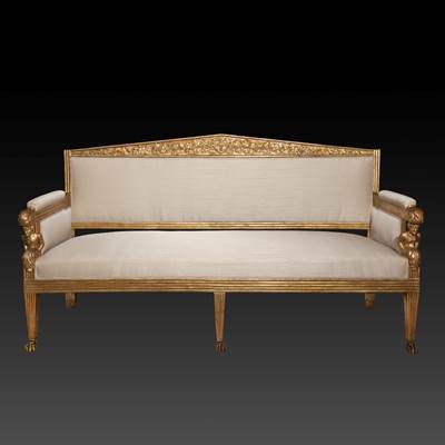 An important carved and gilded sofa, Tuscany, Italy, circa 1820 (198 cm wide, 106 cm high, 68 cm deep) (78 in. wide, 42 in. high, 27 in. deep)