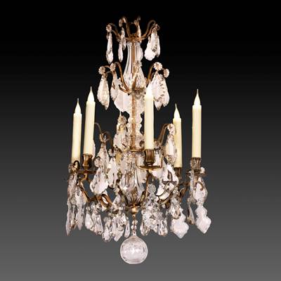 A crystal pampilles chandelier, central part in bronze, 6 arms of light, France, 19th century (85 cm high, 50 cm diameter) (33 in. high, 20 in. diameter)
