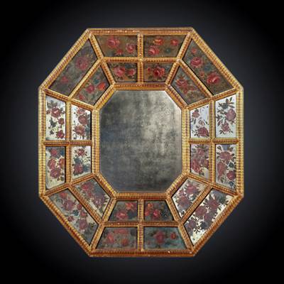 A rare octagonal gilded mirror, the central mirror surrounding by 2 levels of small painted mirrors, Venice, Italy, circa 1700 (73 cm high, 66 cm wide, 9 cm deep) (29 in. high, 26 in. wide, 4 in. deep)