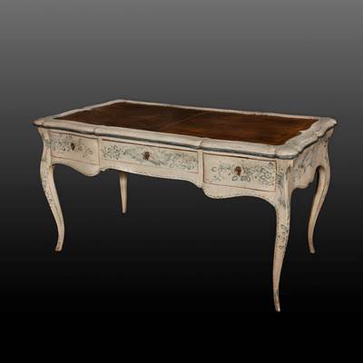 An important painted wood desk, 3 drawers, the top covered by leather, Genoa, Italy, second part of 18th century (150 cm wide, 81 cm high, 80 cm deep) (59 in. wide, 32 in. high, 31 in. deep)