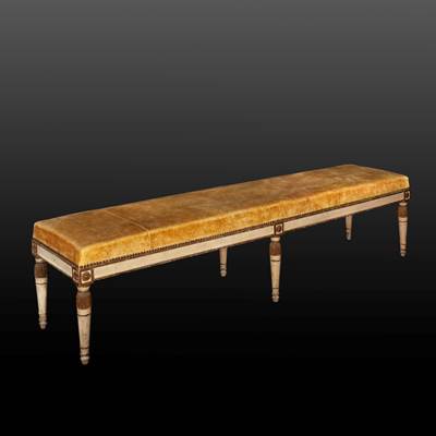 An important gilded and painted bench, 6 feet, Italy, late 18th century (181 cm wide, 44 cm high, 41 cm deep) (71 in. wide, 17 in. high, 16 in. deep)