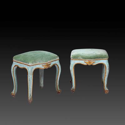 A pair of painted and gilded wood stools, Italy, 18th century (54 cm high, 45 cm wide, 39 cm deep) (21 in. high, 18 in. wide, 15 in. deep)
