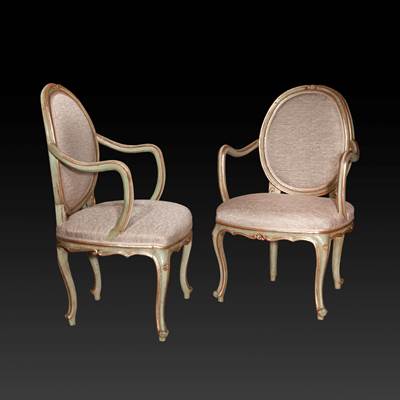 A rare pair of lacquered and silvered armchairs, Venice, about 1760 (96 cm high, 58 cm wide, 55 cm deep) (38 in. high, 23 in. wide, 22 in. deep)