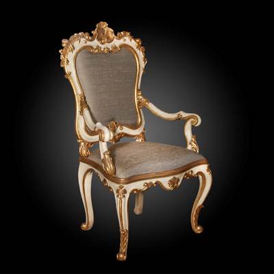 A ceremonial gilded and lacquered wood armchair, Venice, 18th century (125 cm high, 72 cm wide, 65 cm deep) (49 in. high, 28 in. wide, 26 in. deep)