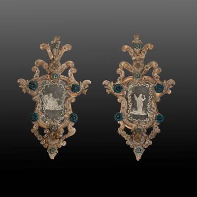 A pair of glass mirrors, with antique engraving characters and iron arms of light, Murano, Venice, circa 1800 (80 cm high, 45 cm wide, 20 cm deep) (31 in. high, 18 in. wide, 8 in. deep)