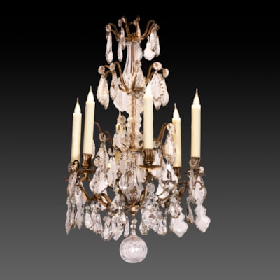A crystal pampilles chandelier, central part in bronze, 6 arms of light, France, 19th century (85 cm high, 50 cm diameter) (33 in. high, 20 in. diameter)