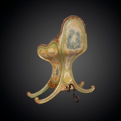 A rare lacquered gondola chair, Venice, 18th century (104 cm high, 90 cm wide, 48 cm deep) (41 in. high, 35 in. wide, 19 in. deep)