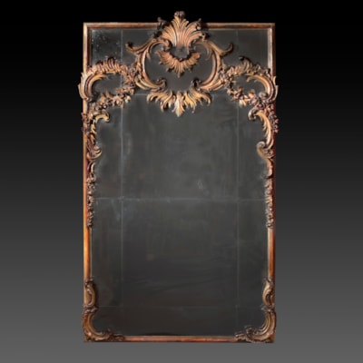 A spectacular gilded and silvered carved wood rectangular mirror, North of Italy, late 18th century (196 cm high, 113 cm wide) (77 in. high, 45 in. wide)