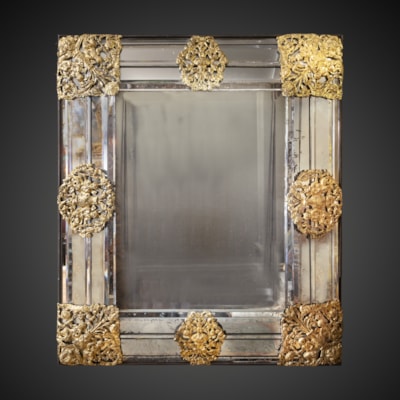 An important rectangular pareclose mirror, brass decoration, Flanders, early 18th century (100 cm high, 86 cm wide) (39 in. high, 34 in. wide)