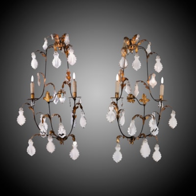 A pair of sconces, 2 arms of light, decoration with crystal drops and iron gilded leaves and fleur-de-lis, Florence, Italy, 19th century (80 cm high, 50 cm wide, 25 cm deep) (31 in. high, 20 in. wide, 10 in. deep)