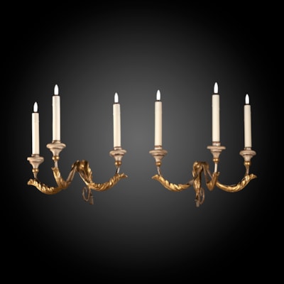 A pair of gilded and painted iron sconces, 3 arms of light, Tuscany, Italy, 18th century (45 cm wide, 45 cm high, 40 cm deep) (18 in. wide, 18 in. high, 16 in. deep)