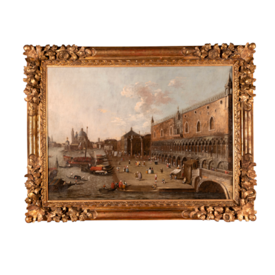 Rare huile sur toile représentant le Palais des Doges et la Riva degli Schiavoni, au fond l'église de la Salute et l'île de la Giudecca, Ecole vénitienne, suiveur de Canaletto, XVIIIème, dans un cadre XVIIIème en bois richement sculpté et doré (avec le cadre  : 112 cm x 86 cm)